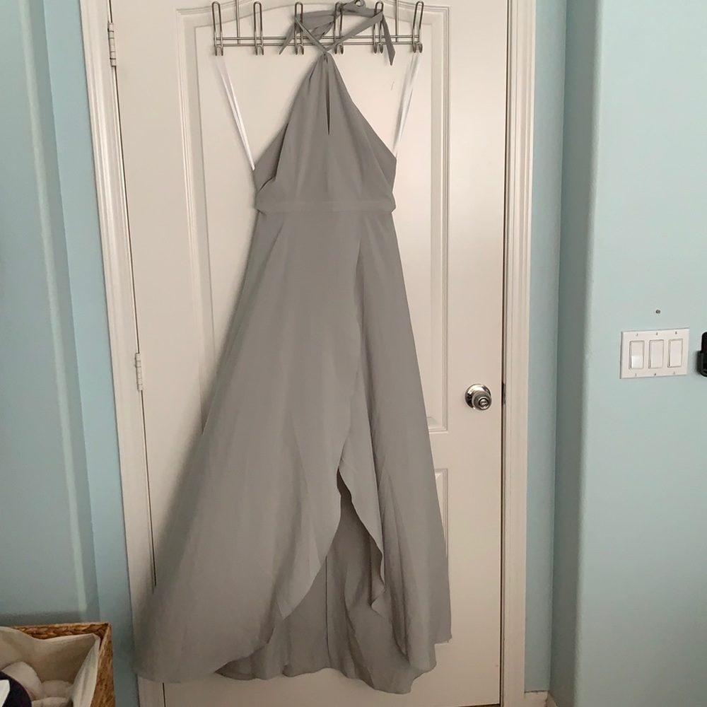 Grey halter top dress with v-neck cut out.